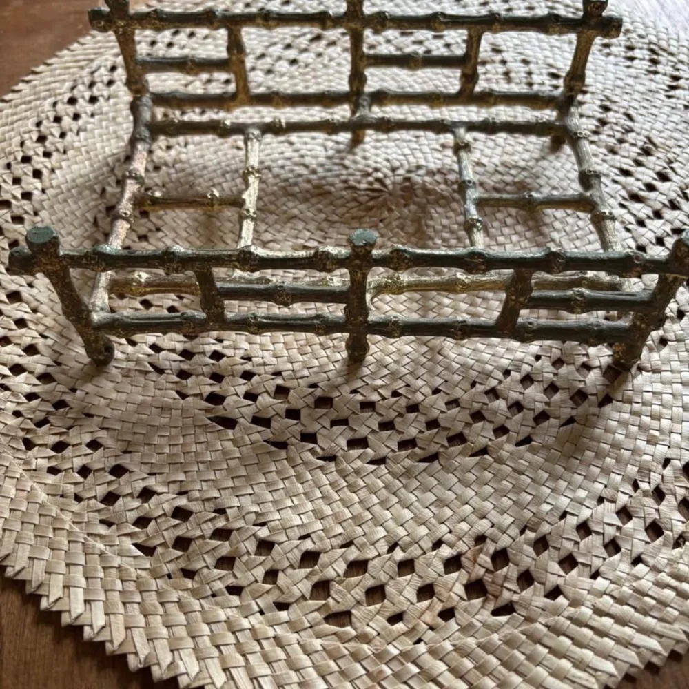 Vintage gold colored bamboo style napkin or mail holder..
